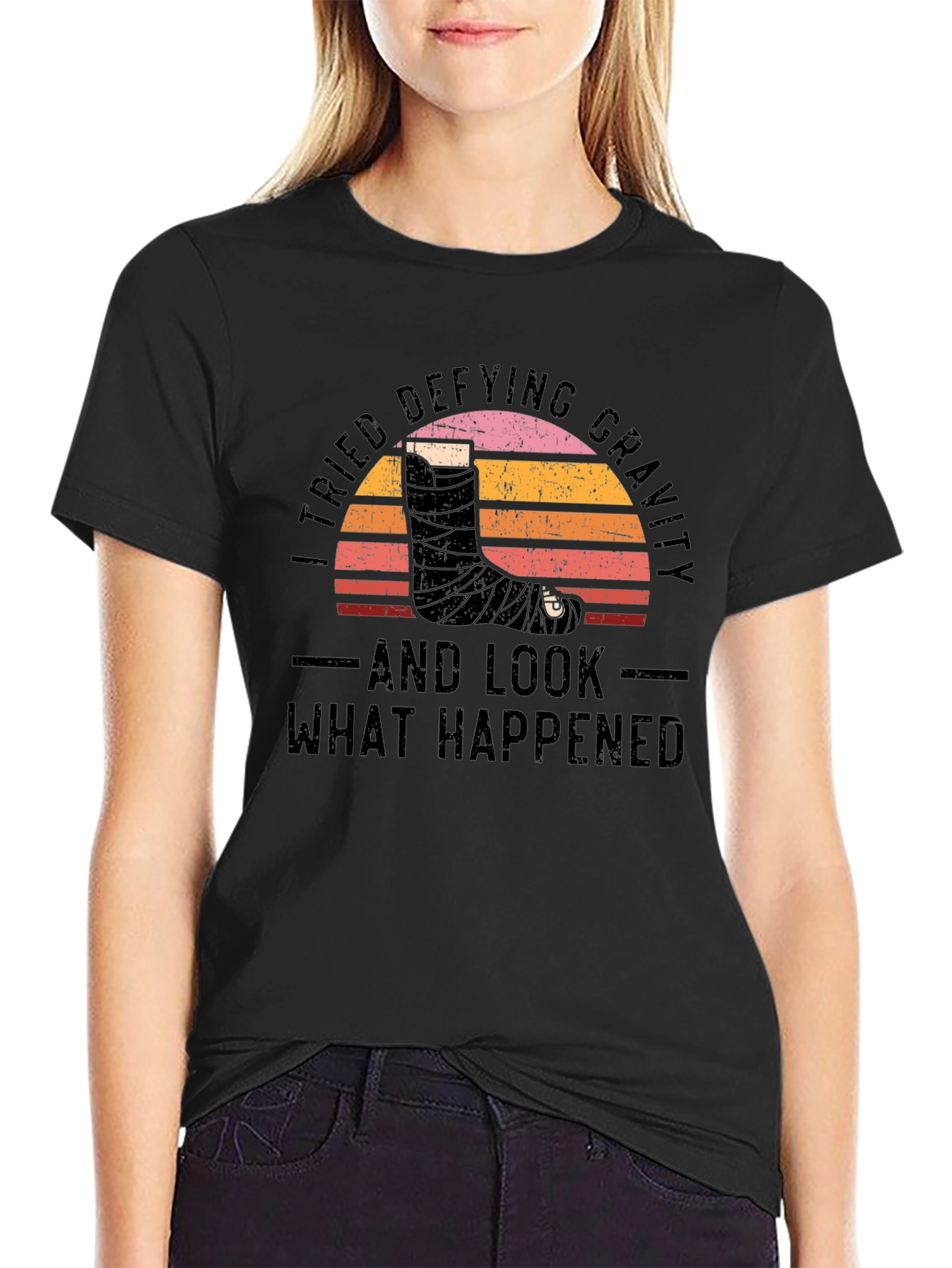 Defying Gravity Graphic Tee - Broken Leg Humor