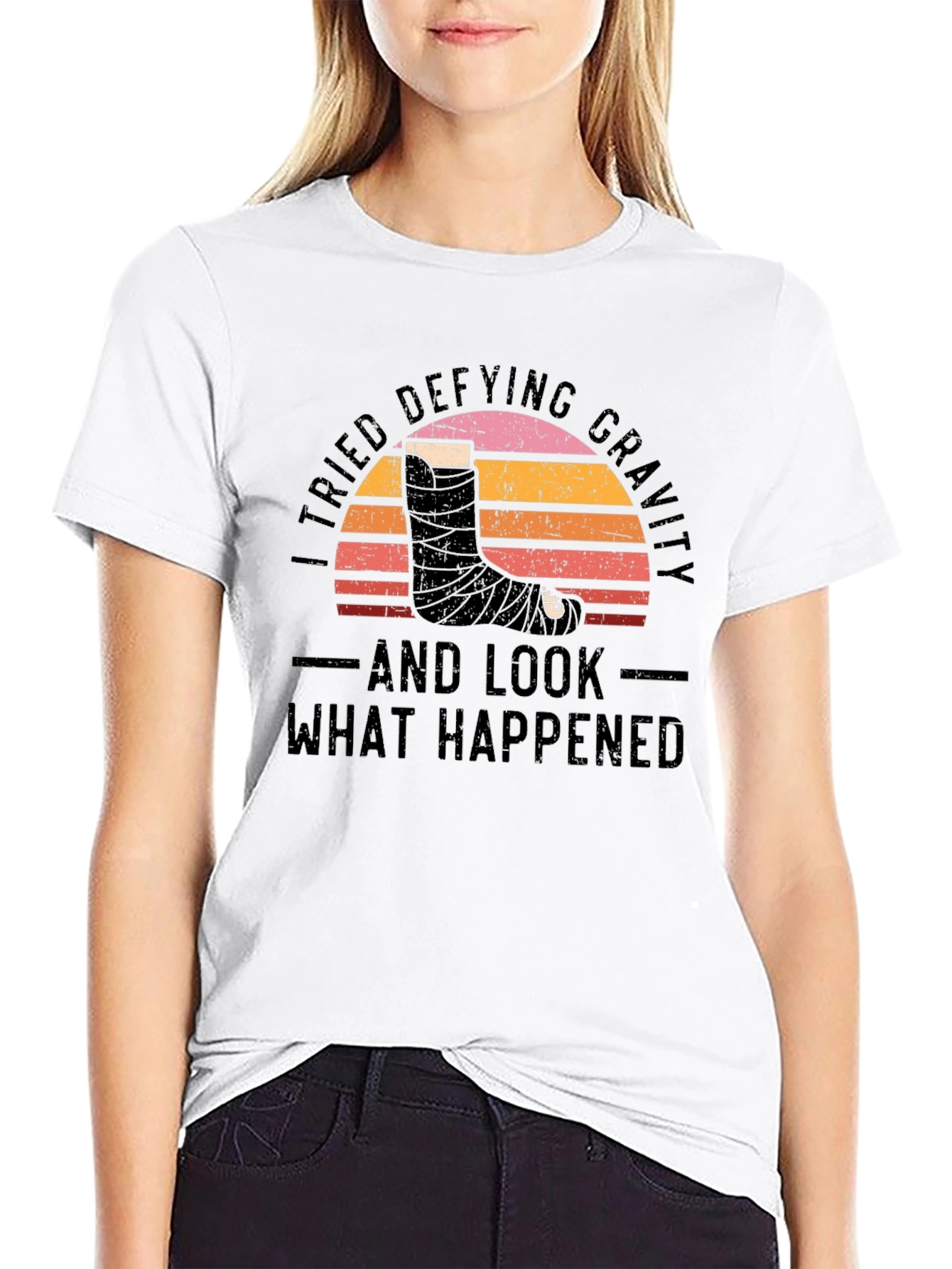 Defying Gravity Graphic Tee - Broken Leg Humor